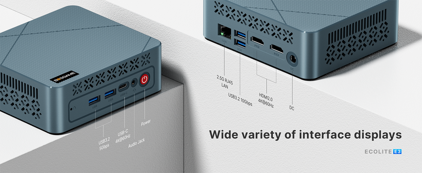 Small, blue-gray mini PC with multiple ports including USB, HDMI, and audio jacks. Features perforated design on sides for ventilation. Shown from two angles with dimensions labeled.